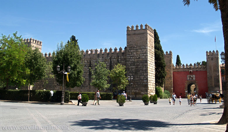 View on the outside and the entrance (to the right) of the Alcazar, Seville 